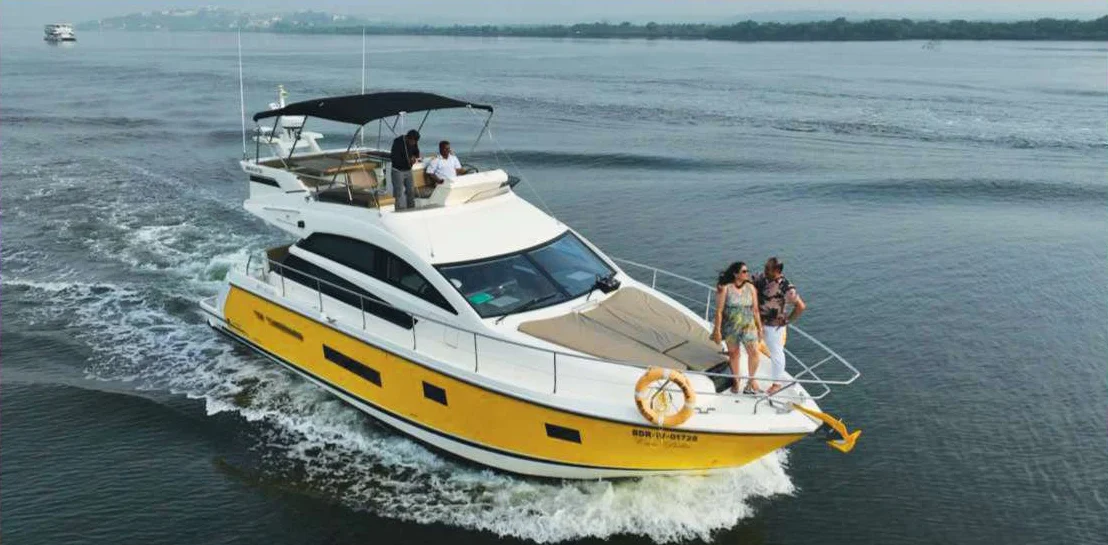 Friends celebrating on the deck of a Yacht Life Goa yacht